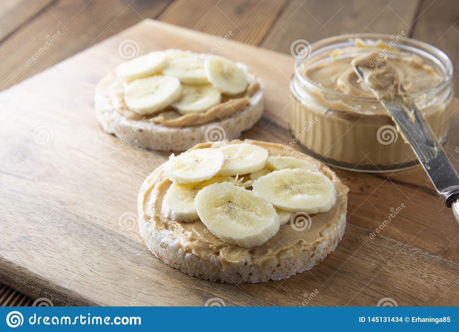 Fuel Your Day with Delicious and Nutritious Rice Cakes topped with Peanut Butter and Banana Slices!