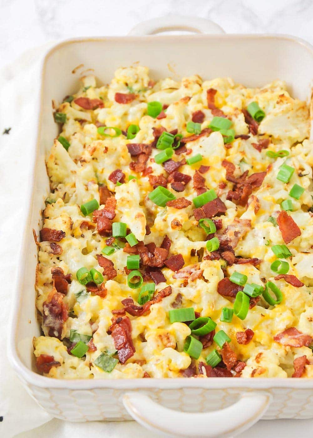 “Indulge in the Delicious and Healthy Twist of Cheesy Baked Cauliflower ‘Rice’ Casserole!”